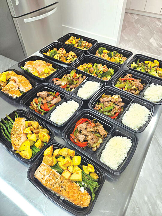 The Kind Kitchen Express is stocked with healthy, pre-made meals that people can pick up and pay for inside the Barber & Beauty Bar in Pacific.